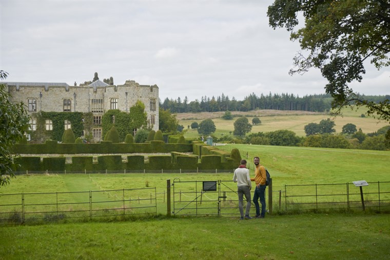 Visitors in the garden at Chirk Castle, Wrexham, Wales <span style='font-size:8px;'>®National Trust Images/Trevor Ray Hart</span>