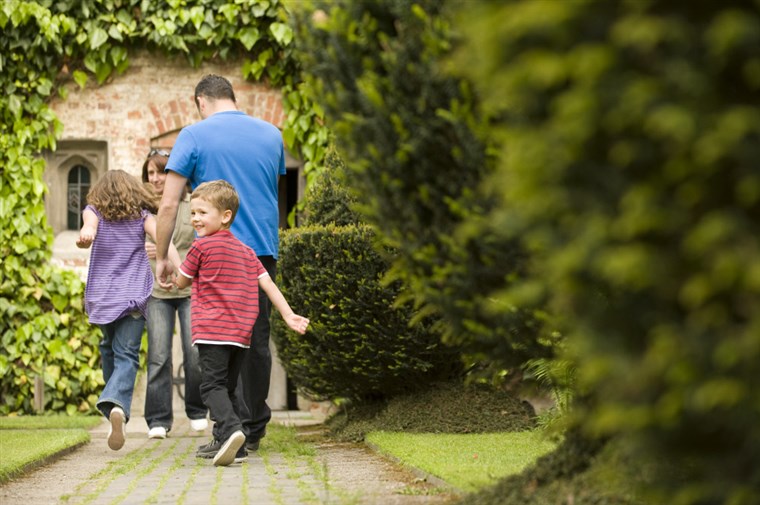 Visitors exploring the garden at Baddesley Clinton, Warwickshire ®National Trust Images/John Millar