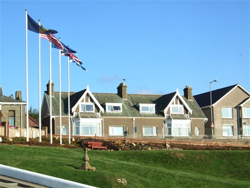 Exterior view from Moray golf club. To the immediate right is BeachView Apartment, our self catering property.
