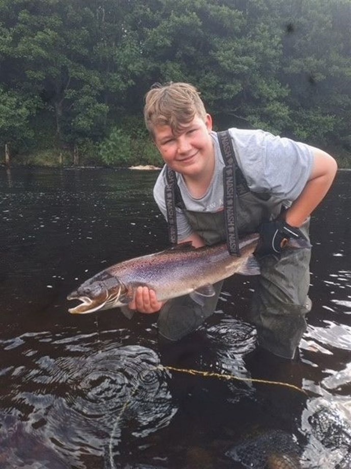 Zach, 14, with his first salmon landed at Warden